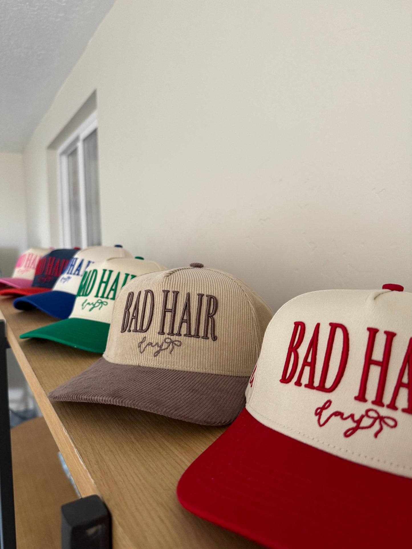 KAXI BAD HAIR DAY TRUCKER HAT: PINK